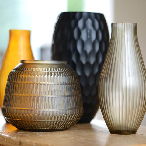 Design your space more with our collection of ceramic, glass and wooden vases.
